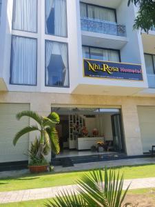 a building with a sign that reads therapy at Khách sạn Nhi Rosa Phú Yên in Liên Trì (4)