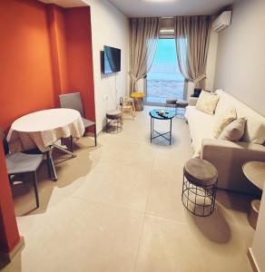 A seating area at Minimal 2bd apartment in Thisio