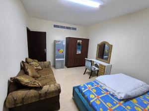 Gallery image of Rooms opposite mega mall in telephone shops roundabout flat no 203 in Sharjah