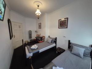 Letto o letti in una camera di Authentic Belgrade Centre Hostel - Only Private Rooms, Paid Parking on-site, Mandatory Reservation