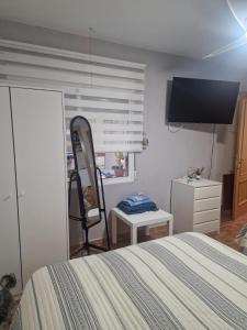 Postel nebo postele na pokoji v ubytování Habitaciones Zoe + 5 fotografií
