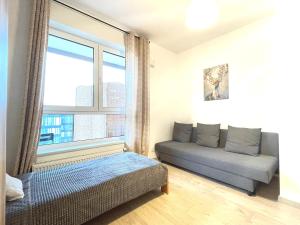 O zonă de relaxare la Superior Komputerowa, 4 rooms, 3 bedrooms, Airport-City train, Metro! 24h reception! +23 fotografii