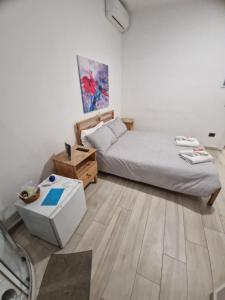 Voodi või voodid majutusasutuse Il Daviduccio Suite toas