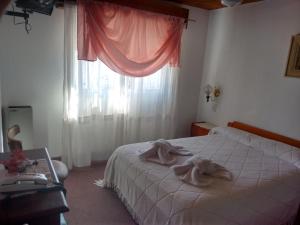 Кровать или кровати в номере Hotel Demi