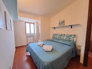 Posteľ alebo postele v izbe v ubytovaní Mirèa Apartment by Casa in mente