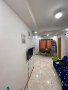 TV a/nebo společenská místnost v ubytování Sunmiles Condominium - 2BR unit M26 + 3 fotografie