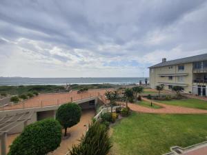 an aerial view of a building with the ocean in the background at 215 Sea View in Cape Town