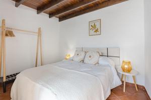 Ένα ή περισσότερα κρεβάτια σε δωμάτιο στο El sendero de Tejina - By Feel your holidays