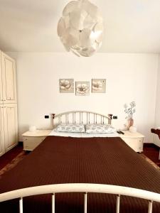 A bed or beds in a room at Dolce Ricordo, locazione turistica
