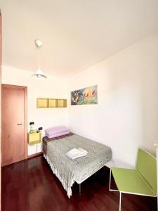 A bed or beds in a room at Dolce Ricordo, locazione turistica