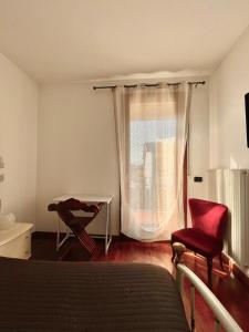 A bed or beds in a room at Dolce Ricordo, locazione turistica
