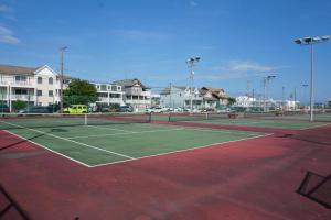a tennis court with a net on top of it at Monaco Motel - Wildwood Beach & Boardwalk in Wildwood