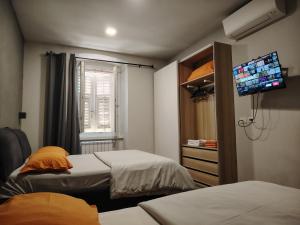 A bed or beds in a room at Fabio Haus Trieste