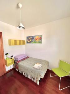 A bed or beds in a room at Dolce Ricordo, locazione turistica