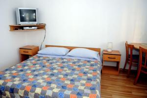 Ένα ή περισσότερα κρεβάτια σε δωμάτιο στο Room Port