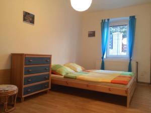 A bed or beds in a room at Apartment Liberec Stříbrný Kopec