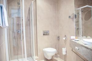 Koupelna v ubytování Pension Opera Suites I Self Check In