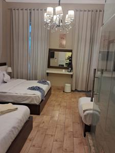 Postel nebo postele na pokoji v ubytování Grand Agor Hotel Cairo