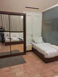 Postel nebo postele na pokoji v ubytování Grand Agor Hotel Cairo