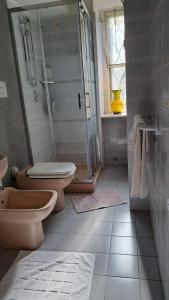 Koupelna v ubytování Appartamento in Corte Storica