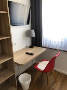 TV a/nebo společenská místnost v ubytování Gasthaus Sonnen