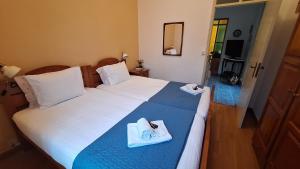 Postel nebo postele na pokoji v ubytování Center Beach Apartment