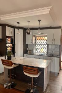 Køkken eller tekøkken på Self catering three bedroom