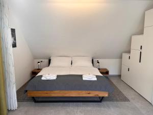 Posteľ alebo postele v izbe v ubytovaní Loft am Park