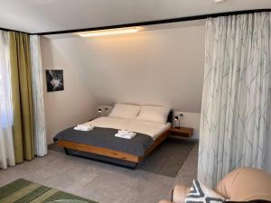 Posteľ alebo postele v izbe v ubytovaní Loft am Park