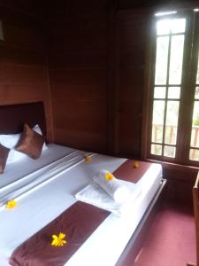 Una cama o camas en una habitación de Pavona Lake 21 fotos más