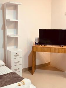 Sjónvarps- og/eða afþreyingartæki á Hotel Coffee Real Pereira