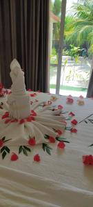 Postel nebo postele na pokoji v ubytování Vegas Thoddoo Maldives