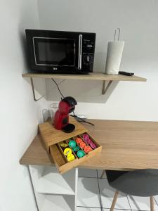 Η κουζίνα ή μικρή κουζίνα στο Le studio du Port Boinot