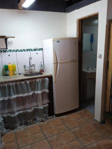 Kuchyň nebo kuchyňský kout v ubytování Descanso + 12 fotografií