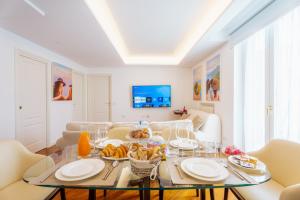 a living room with a table with food on it at Casa e Arte in Sorrento