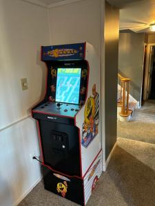 a video game arcade machine in a room at Spacious Mountainside Home In Jackson Incredible Views, Hot Tub, Pet Friendly in Jackson +21 photos