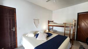 Postel nebo postele na pokoji v ubytování Casarão 121 - Guest House