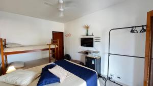 Postel nebo postele na pokoji v ubytování Casarão 121 - Guest House