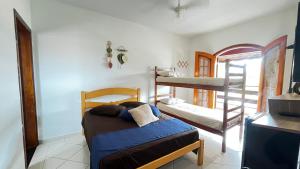Postel nebo postele na pokoji v ubytování Casarão 121 - Guest House