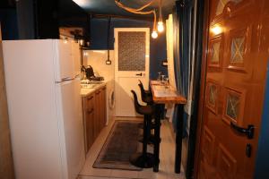 Kuchyň nebo kuchyňský kout v ubytování Albania Studio Apartament