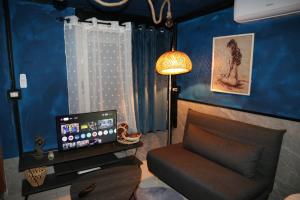 TV a/nebo společenská místnost v ubytování Albania Studio Apartament