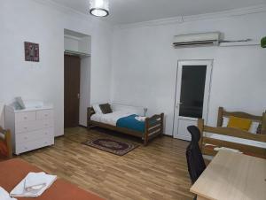 Postel nebo postele na pokoji v ubytování GT Boutique Hotel