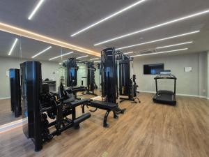 a gym with lots of equipment in a room at Transamerica Dunas de Marapé - Alagoas in Jequia da Praia +92 photos
