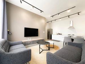 TV a/nebo společenská místnost v ubytování Unit 310