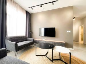 TV a/nebo společenská místnost v ubytování Unit 310