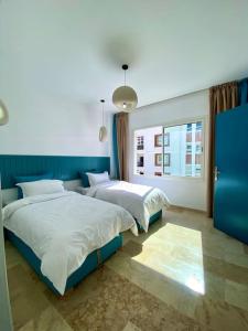 Postel nebo postele na pokoji v ubytování Une sensation d'hôtel cinq étoiles + 2 fotografie