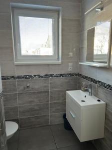 Koupelna v ubytování Apartmány Levandule