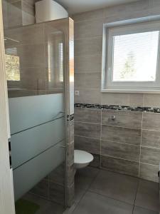 Koupelna v ubytování Apartmány Levandule