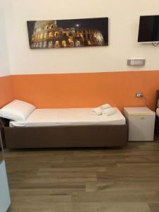 A television and/or entertainment centre at Mole Adriana Guest House