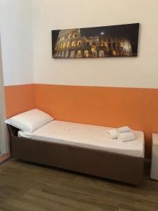 A bed or beds in a room at Mole Adriana Guest House